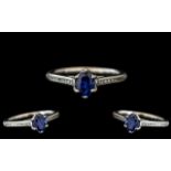 Platinum - Contemporary Sapphire and Diamond Set Dress Ring.