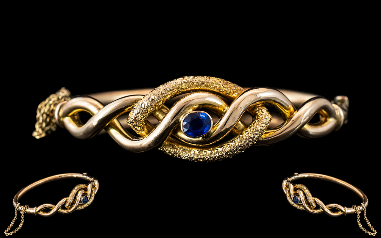 Victorian Period 1837 - 1910 Superb 9ct Gold Sapphire Set Ornate / Hollow Bangle with Safety Chain.