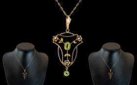 Edwardian Period 1902 - 1910 Exquisite and Well Designed 9ct Gold Pendant Drop Set with Peridots