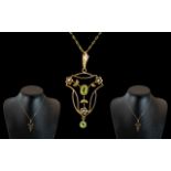 Edwardian Period 1902 - 1910 Exquisite and Well Designed 9ct Gold Pendant Drop Set with Peridots