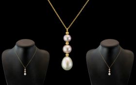 18ct Gold - Fine Quality and Attractive Pearl Drop Pendant In Graduated Form, Attached to a 18ct