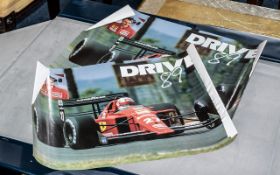 Two Formula One Posters, Drive '89, Nigel Mansell and racing car.