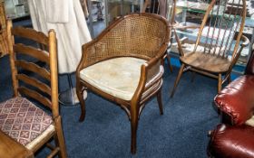 Mahogany Framed Begere Tub Chair with bamboo effect frame, and upholstered seat. 33'' high x 24''