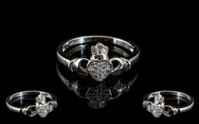 Diamond Set Claddagh Ring, the two clasping hands, representing friendship,