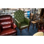 Antique Victorian Throne Chair in green leather, raised on lion claw feet. Seat needs attention.