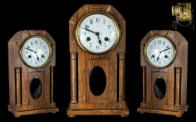 Arts & Crafts - Medium Oak Cased Mantel Clock, Pendulum Driven ( Visible ) 8 Day Striking on a Gong.