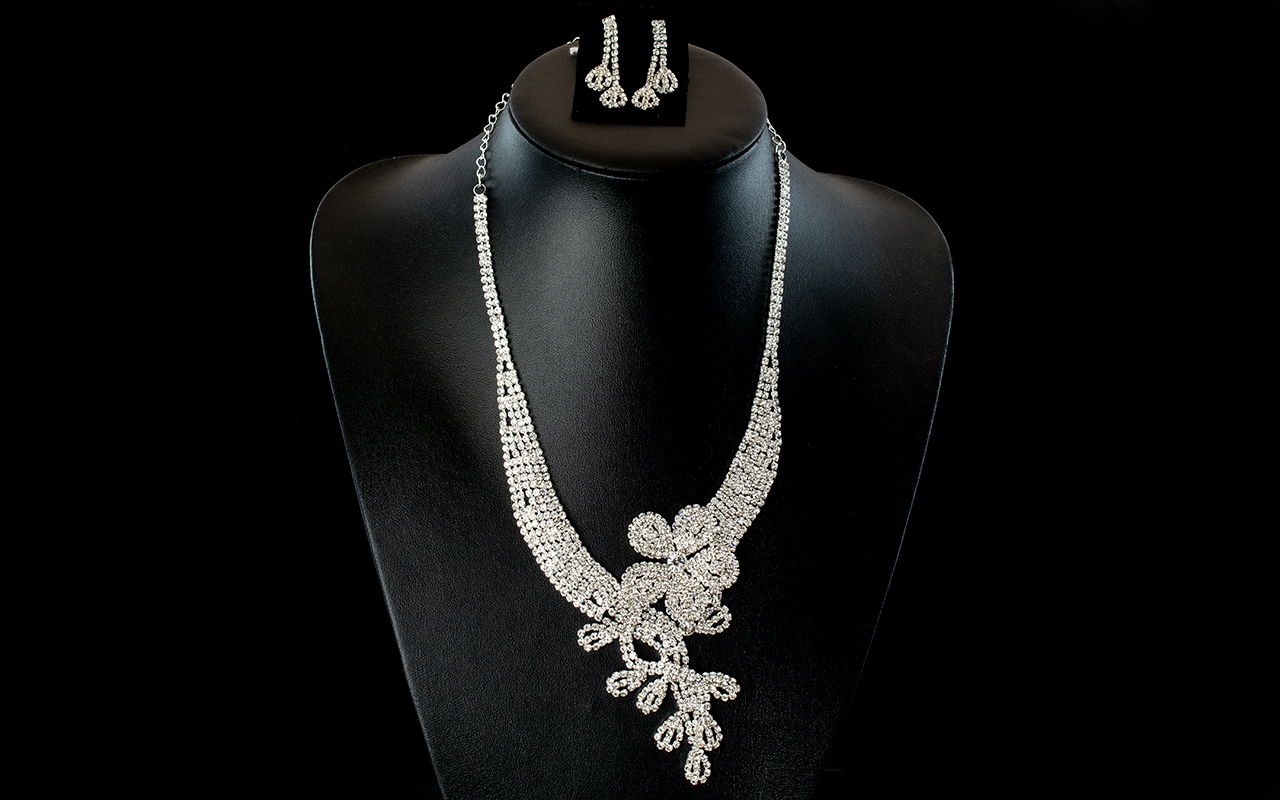 Asymmetric 'Flower and Leaves' White Crystal Necklace and Matching Drop Earrings,