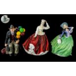Three Royal Doulton Figurines comprising 'The Balloon Man' HN 1954, 8" tall,
