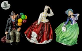 Three Royal Doulton Figurines comprising 'The Balloon Man' HN 1954, 8" tall,