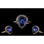 Ladies 9ct Gold - Superior Quality Tanzanite and Diamond Set Cluster Ring.