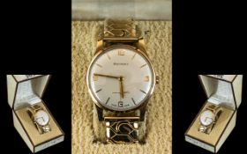 Gent's 9ct Gold Rotary Wrist Watch with Arabic and baton numerals, manual wind,