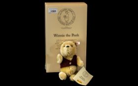 Steiff 'Winnie The Pooh', with original box and certificate. Limited edition No. 02974, Serial No.