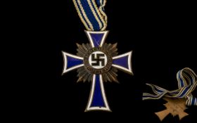 Third Reich Nazi German Mother’s Cross in Bronze with original ribbon.