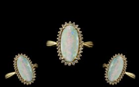 18ct Gold Attractive Opal and Diamond Set Dress Ring full hallmark for 750 to interior of shank. The