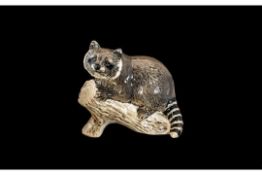 Beswick Racoon No. 2194, marked Beswick to base. Measures 4'' x 5''.