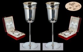 Cartier Superb Pair of Sterling Silver Goblets, housed in large red leather Cartier Display Box.