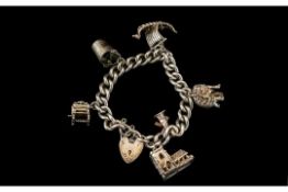 Vintage Silver Heavy Charm Bracelet, a chunky bracelet with very good charms including a Stanhope,