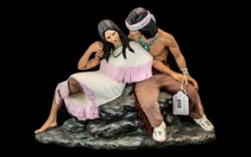 Painted Plaster Figure of a Romantic Couple on a Rock realistically modelled. Height 11'' x 15''.