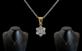 18ct Gold - Pleasing and Petite Diamond Set Cluster Pendant, Chain and Pendant Marked 18ct.