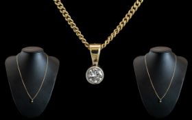 Ladies - Attractive 9ct Gold Single Diamond Set Pendant Attached to a 9ct Gold Chain.