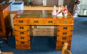 Campaign Style Pedestal Desk, with green leather tooled top,