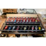 Formula One Interest - Two display cases each containing ten die cast racing car models including
