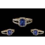 Ladies - Superb 18ct Gold Tanzanite and Diamond Set Dress Ring.