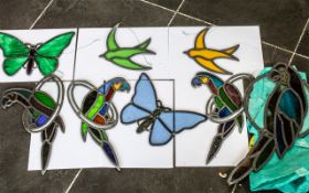 Collection of Antique Lead Glass Exotic Birds, eight exotic birds in antique lead glass,