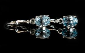 Sky Blue Topaz Solitaire Drop Earrings, comprising oval cut, solitaire, sky blue topaz,