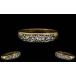 18ct Yellow Gold - Superior Quality and Attractive Seven Stone Diamond Set Dress Ring.