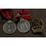Third Reich Nazi German Medals: two Winterschlacht im Osten 1941/42 Medals each with original