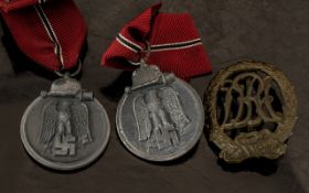 Third Reich Nazi German Medals: two Winterschlacht im Osten 1941/42 Medals each with original