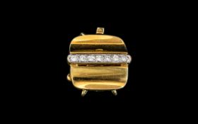 An 18ct Gold Diamond Set Pearl Clasp set with a line of 7 round brilliant cut diamonds, stamped 750.