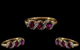 Ladies - 9ct Gold Attractive Pink Sapphires and Diamond Set Dress Ring.