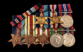 Two WW2 British medal groups on bars. 39/45 Star, Africa Star, Italy Star, and War Medal, and 39.