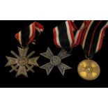 Third Reich Nazi German Medals: War Merit Cross with Swords, War Merit Cross and War Merit Medal.