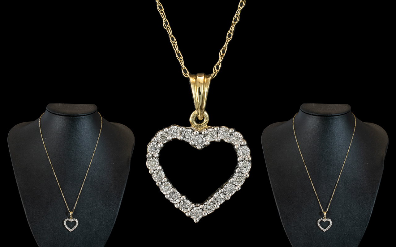 9ct Gold Heart Shaped Diamond Set Pendant with Attached 9ct Gold Chain.
