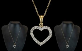 9ct Gold Heart Shaped Diamond Set Pendant with Attached 9ct Gold Chain.