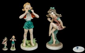 W. Goebel - Pair of Hand Painted Early Figures.