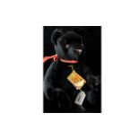 'Hermann' Black Growler Teddy Bear, Approx. 12" Tall. Black fur, medallion attached.