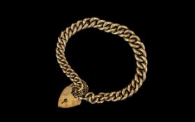 9ct Gold - Heavy Albert Curb Bracelet with Heart Shaped Padlock. All Links Stamped for 9ct.