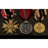 Third Reich Nazi German Medals: Western Front Medal 1941/2, War Merit Medal and West Wall Medal.