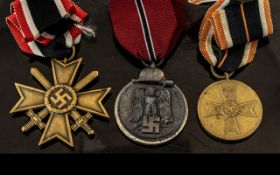 Third Reich Nazi German Medals: Western Front Medal 1941/2, War Merit Medal and West Wall Medal.