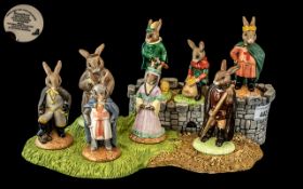 Royal Doulton 'Bunnykins' Robin Hood Collection with Stand, comprising Robin Hood,