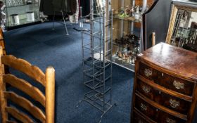 Metal Shoe Rack, modern upright style. Measures 40" tall x 14" wide.