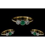 18ct Gold - Superb Quality 3 Stone Diamond and Emerald Set Dress Ring. Rub-over Setting.