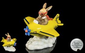 Royal Doulton Bunnykins 'Chocs Away' Figure, Bunnykins in a bright yellow plane, No. DB 267.