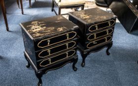 A Chinoiserie Decorated Pair of Three Drawer Cabinets, black lacquered with gilt highlights and