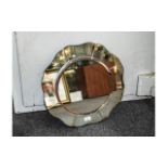 Lovely 1950s Sectional Mirror, bevelled circular front raised on eight curved outer sections.