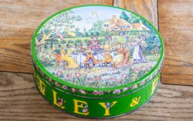 Huntley & Palmer Biscuit Tin 'Rude', decorated with a tea party and cottage.